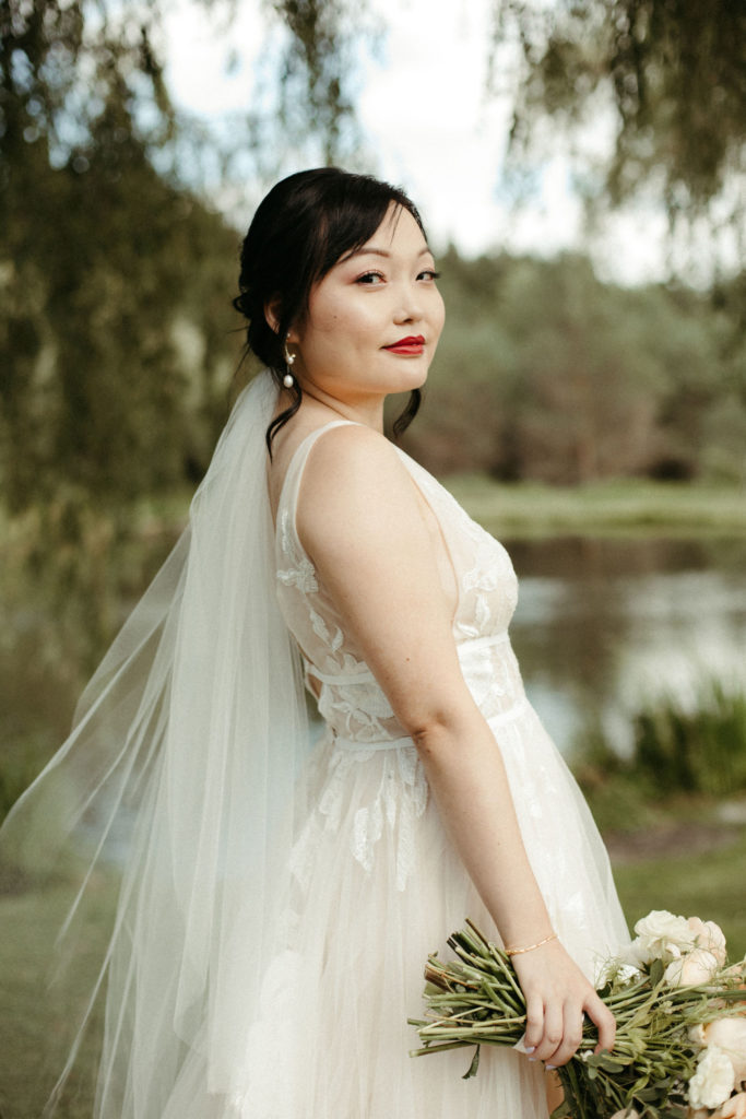 A bride wearing red lipstick.
