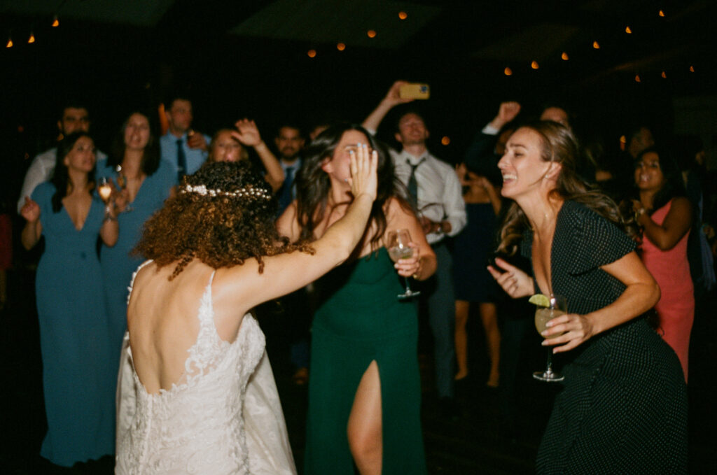 Lively Dance Floor: Energy and joy captured on the dance floor, showcasing the genuine and lively celebration at Red Maple Vineyard.