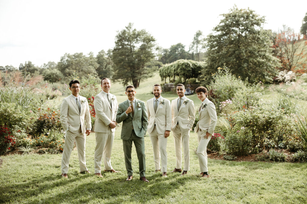 Groomsmen in Cream Suits: Cream-suited groomsmen add sophistication to the wedding, complementing the overall aesthetic.