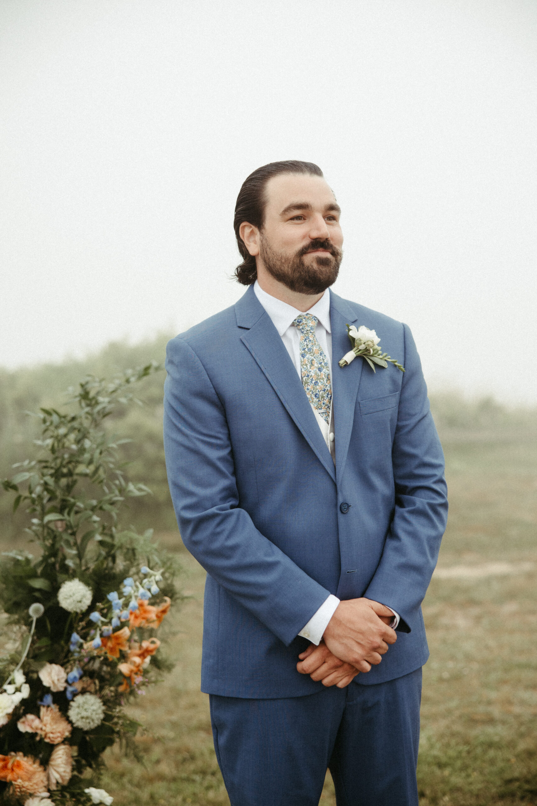 The groom tears up as his bride walks down the aisle.