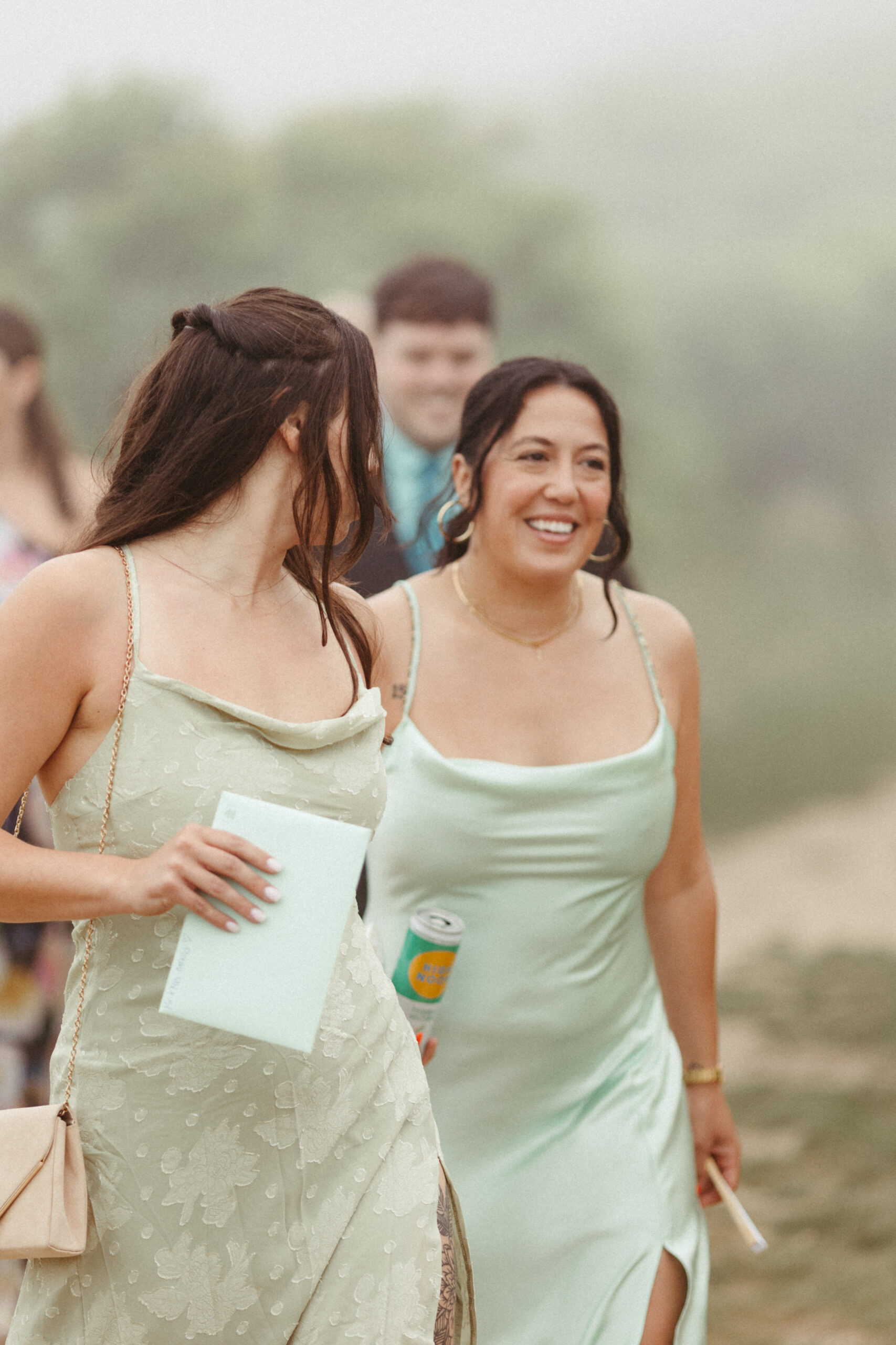 Guest walk through the fog towards the ceremony site at Camp Hero.